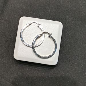 Silver hoop earrings.
